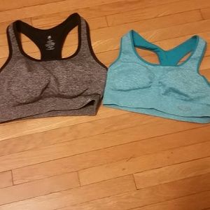 2 sports bras new balance and champiom